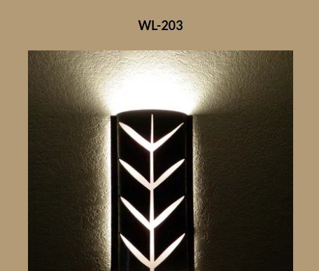 Wall sconce WL-203 lit, chevron cutout pattern glowing on wall